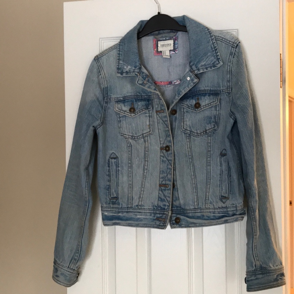 Distressed jean jacket.